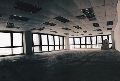 Inside an empty, tall office block.