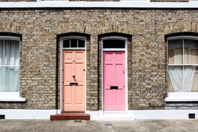 Peach and pink doors of neighbours